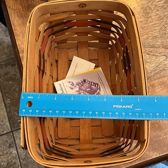 Longaberger Basket. Red & blue trim. 10.5 by 7.5 w/ handle. Paperwork included. - Picture 6 of 6